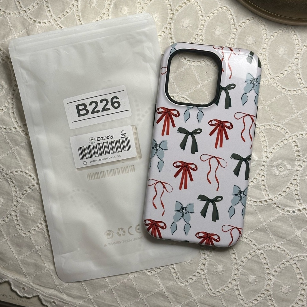 Festive Girls Christmas Bows iPhone 14 Pro Phone Case